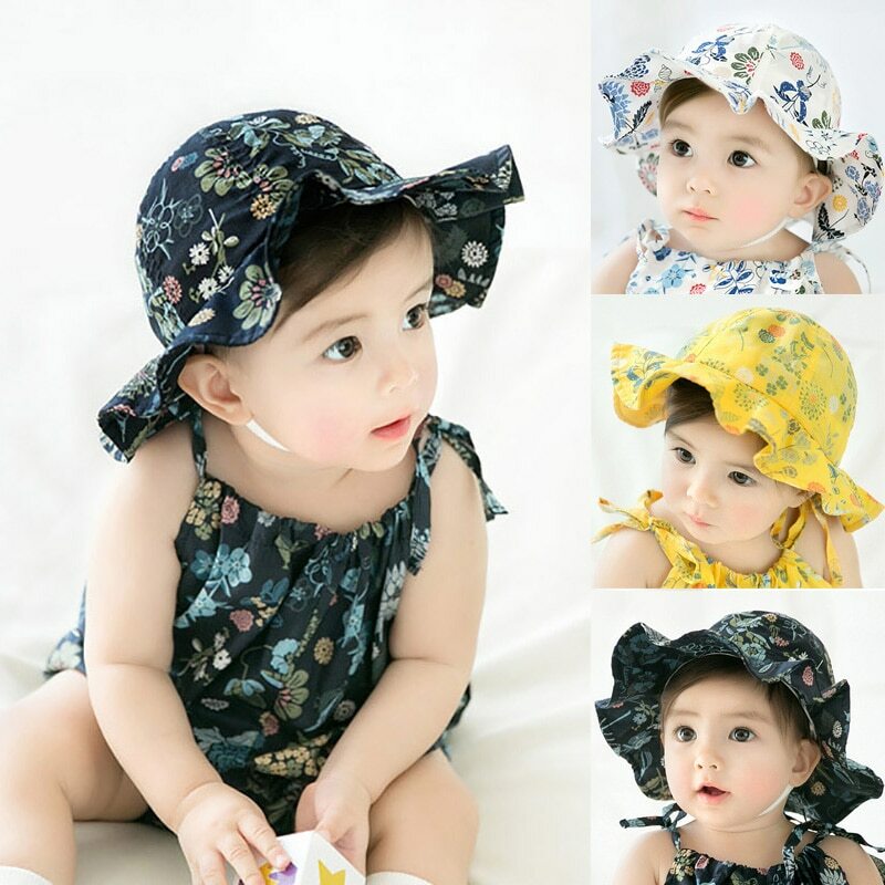 baby with bucket hat
